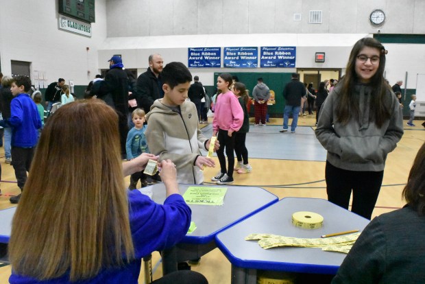 Students get tickets on Friday March 1 at the Gower PTO Fun Fair, one of the PTO's biggest fundraisers of the year. (Jesse Wright)