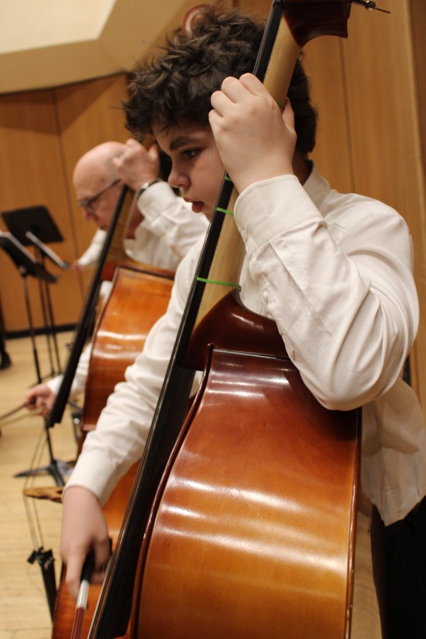 Elijah Kirchner, student bass player from Haven Middle School, performed in the Young Persons' Concert at Pick-Staiger Concert Hall in Evanston on March 9. Photo by Gina Grillo.