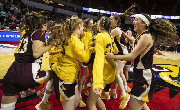 Loyola's Clare Weasler and Aubrey Galvan, listen to their coaches during a fourth-quarter timeout in the Class 4A state championship game against Nazareth at CEFCU Arena in Normal on Friday, March 1, 2024. (Vincent D. Johnson / Pioneer Press)