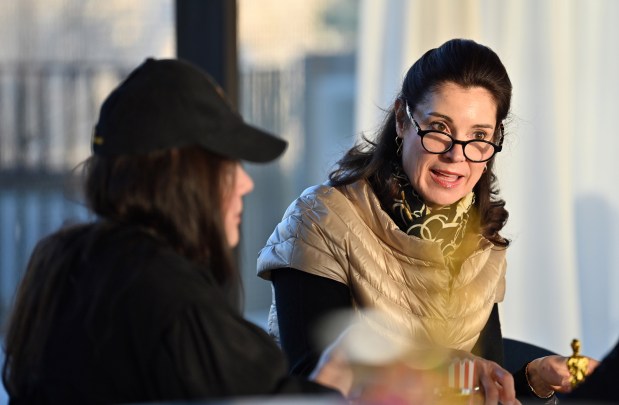 From left to right, Jennifer Maxwell Parkinson of Glencoe, president of WLC Northshore Woman's Library Club and Beth Ann Papoutsis of Winnetka have their ballots at the annual WLC annual Oscars Viewing Party at Writers Theatre in Glencoe on March 10, 2024. (Karie Angell Luc/Pioneer Press)