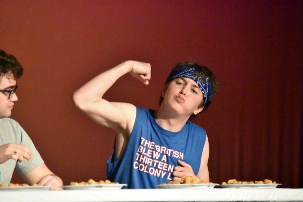 Junior Nicholas Edwards eats to win during the talent portion of the Mr. LT contest. Edwards' talent was eating a lot of tater tots. (Jesse Wright)