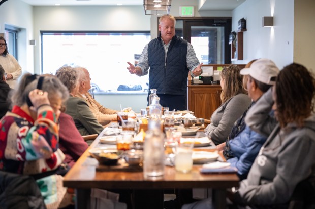 Crown Point mayor Peter Land welcomes members of the tourism industry during a visit by the Heartland Familiarization tour to Provecho Latin Provisions in Crown Point on Tuesday, March 5, 2024. (Kyle Telechan/for the Post-Tribune)