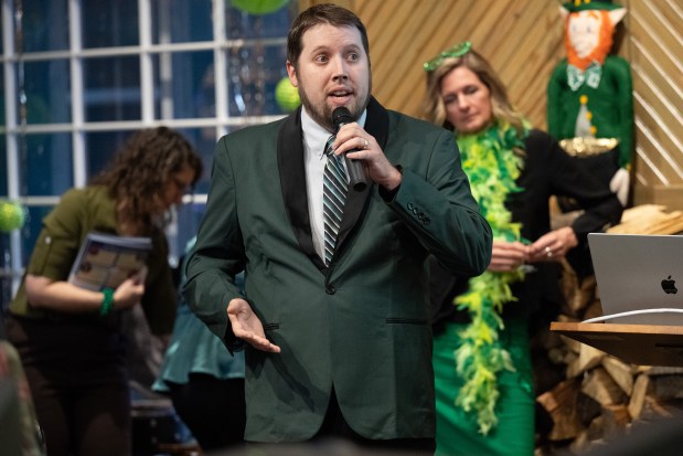 Indiana Dunes Tourism prodution director Dustin Ritchea speaks about an upcoming video project during a program to highlight tourism in Porter County at Riley's Railhouse in Chesterton on Thursday, March 14, 2024. (Kyle Telechan/for the Post-Tribune)