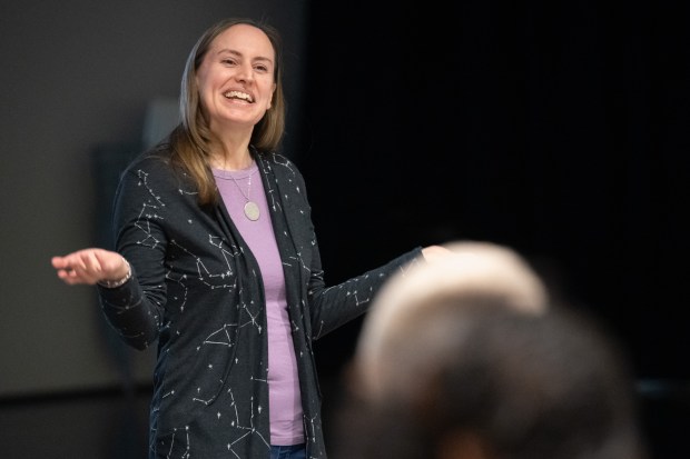 Indiana University astrophysicist Dr. Jessica Warren answers questions about the upcoming partial solar eclipse during an event at the Gary Public Library on Saturday, March 23, 2024. (Kyle Telechan/for the Post-Tribune)