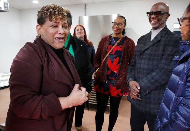 Faith Farms Administrator Freida Graves (left) shares a laugh with visitors during the grand opening ceremony at Faith Farms and Orchard in Gary. The Faith Fresh Frozen program is a new initiative aimed at promoting healthier lifestyles and fostering community well-being in the city. The ground breaking took place on March 21, 2024. (John Smierciak/Post-Tribune)