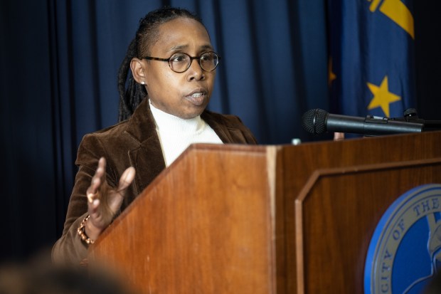 Fearless Coaching and Consulting owner Lisa Bennett, who received $10,000 for her business in the form of American Rescue Plan Act grants, recounts her previous experience in consulting as she speaks during a meet and greet and check presentation event in Gary on Wednesday, March 6, 2024. (Kyle Telechan/for the Post-Tribune)