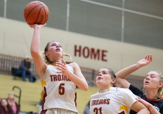 Chesterton guard Kenedi Bradley puts the ball up during a game against Washington Township on Tuesday, December 5, 2023. (Kyle Telechan for the Post-Tribune)