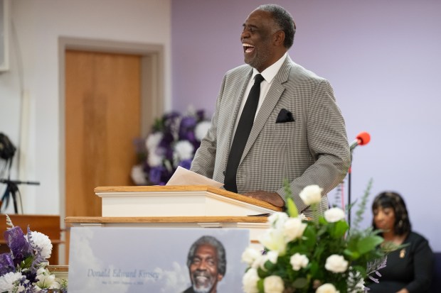 Family friend Bruce Carey laughs as he recalls memories of Kinsey Report blues band members and brothers Ralph and Donald Kinsey during a memorial service in their honor on Saturday, March 2, 2024 in Gary. (Kyle Telechan/for the Post-Tribune)