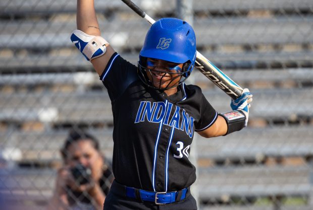 Lake Central's Jolie Adams (30) stretches before an at-bat against Penn during the Class 4A West Lafayette Harrison Semistate championship game, in West Lafayette on Saturday, June 3, 2023. (Vincent D. Johnson/Post-Tribune).