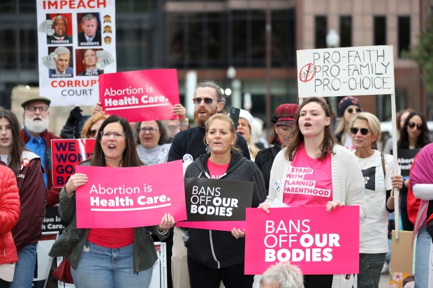 Supporters of Issue 1, the Right to Reproductive Freedom amendment, attend a rally held by Ohioans United for Reproductive Rights at the Ohio Statehouse in Columbus, Ohio, Sunday, Oct. 8, 2023. 