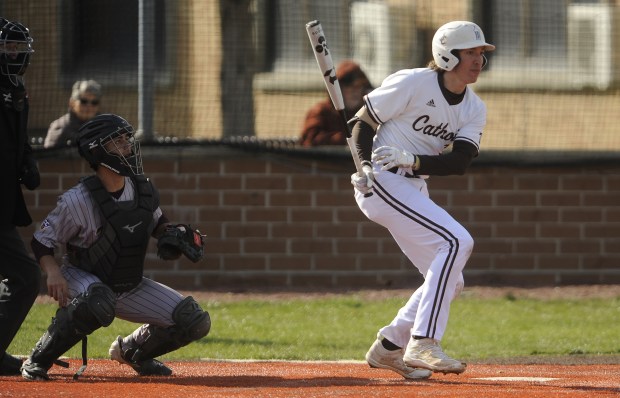 Joliet Catholic's Jake Troyner (22) take off after connecting for a hit against Lockport during the WJOL / Don Ladas Memorial Baseball Tournament Wednesday, March 27, 2024 in Joliet, IL. (Steve Johnston/Daily Southtown)