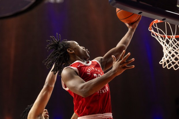 Homewood-Flossmoor's Carson Brownfield (30) goes for a layup against Normal Class 4A state championship game at State Farm Center in Champaign on Saturday, March 9, 2024. (Vincent D. Johnson/for the Daily Southtown)