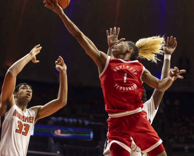 Homewood-Flossmoor's Gianni Cobb (1) extends for a basket against Normal Class 4A state championship game at State Farm Center in Champaign on Saturday, March 9, 2024. (Vincent D. Johnson/for the Daily Southtown)