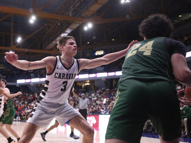 Mt. Carmel guard Grant Best (3) defends as St. Patrick guard Harper Krolak (24) inbounds the ball during the Class 3A UIC Supersectional at Credit Union 1 Arena in Chicago on Monday, March 4, 2024. (Trent Sprague/for the Daily Southtown