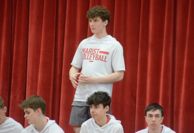 Marist's Griffin McElroy stands while watching a quarterfinal game at the Marist Invitational on Saturday, March 23, 2024. (Jeff Vorva / Daily Southtown)