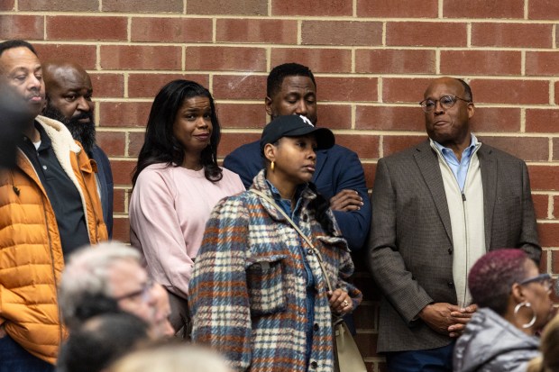 Cook County State's Attorney Kim Foxx, center rear, a Flossmoor resident, looks on during a public comment portion of Monday's Village Board meeting in Flossmoor. (Vincent D. Johnson/for Daily Southtown)