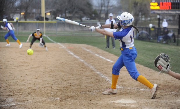 Sandburg's Addison Torgerson (14) connects for a hit against Richards during a nonconference game Wednesday, March 13, 2024 in Oak Lawn, IL. (Steve Johnston/Daily Southtown)