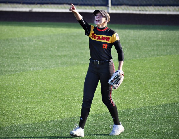 Tinley Park's Megan Piotrowski directs traffic from center field on a shallow pop fly during a game against Stagg Tuesday, March 19, 2024, in Palos Hills.(Jon Cunningham/for the Daily Southtown)