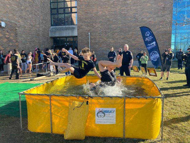 Andrew High School sophomore Jameson Vaught (left) and freshman Christian Escalona (right) participated in the school's polar plunge event Feb. 29, 2024. (Alexandra Kukulka/Daily Southtown)