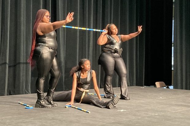 Destiny Harris, from left, Destiny "D.J." Johnson and Makyla Tate practice their step routine March 26, 2024 honoring Sigma Gamma Rho Sorority, Inc. (Alexandra Kukulka/Daily Southtown)