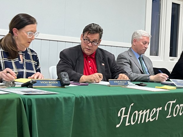 Homer Township Clerk Vicki Bozen, from left, Supervisor Steve Balich, center, and attorney Mike Hayes at Monday's board meeting. (Michelle Mullins/for Daily Southtown)