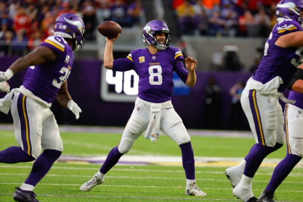 Vikings quarterback Kirk Cousins throws a pass against the Chiefs on Oct. 8, 2023, in Minneapolis.