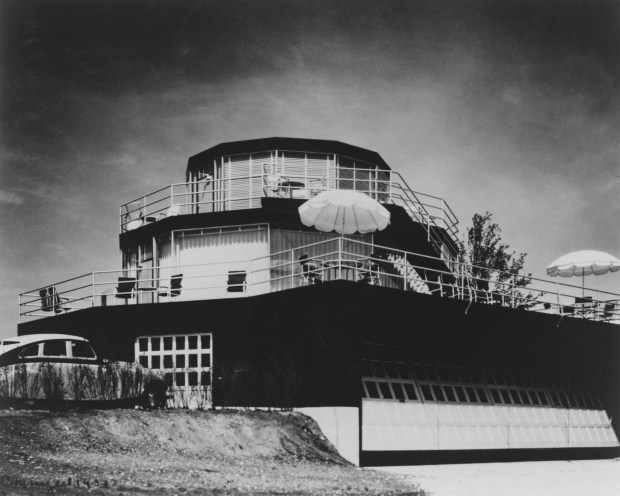 The 'Century Homes House of Tomorrow,' by architect George Fred Keck, was featured at the Century of Progress World's Fair in Chicago 1933. The home consists of several stacked 'drums,' with glass-enclosed living quarters above and a ground floor airplane hanger below. (File photo)