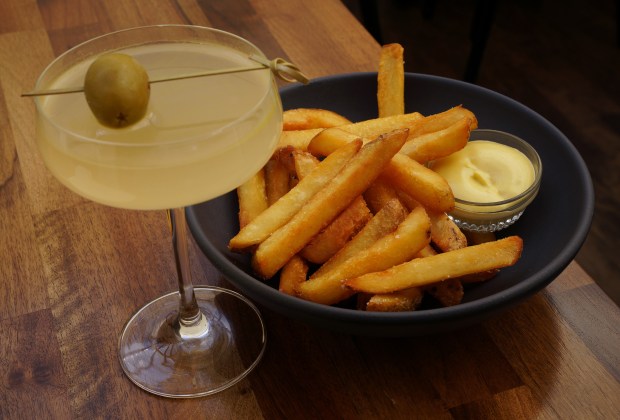 The "Chicago Happy Meal" - beef fat fries and a martini cocktail, at John's Food & Wine. (E. Jason Wambsgans/Chicago Tribune)