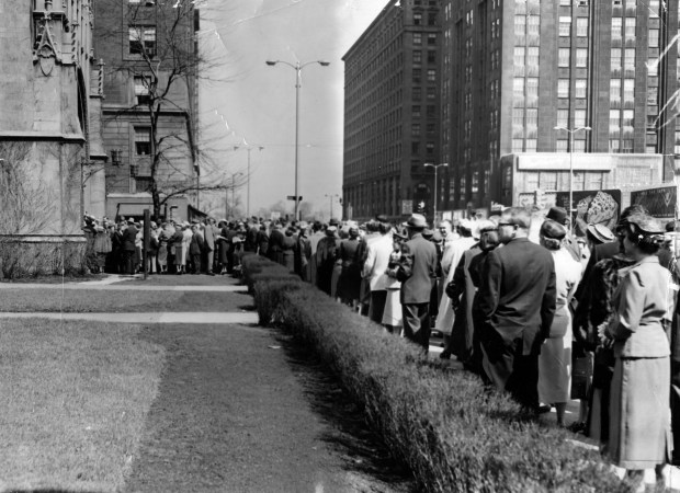 A large crowd is lined up outside Fourth Presbyterian Church on North Michigan Avenue waiting to get inside for Easter Sunday service on April 11, 1955, in Chicago. (Oliver Cliff/Chicago Tribune)