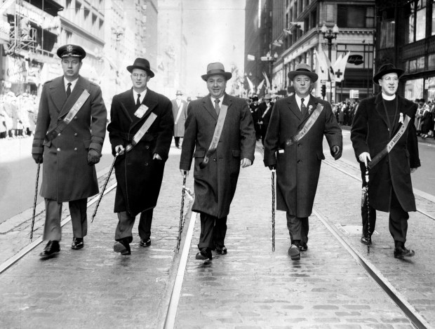 Mayor Richard J. Daley, center, walks at the front of the St. Patrick's Parade down State Street on March 15, 1967, in Chicago. (Chicago American)