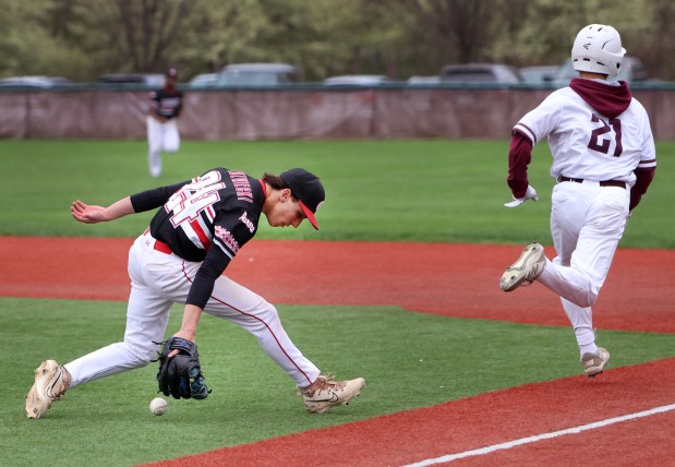 Aurora Christian's picture Owen Niedzwiecki chases the ball during the boys baseball game against Wheaton Academy Wednesday, April 17, 2024, in West Chicago. (James C. Svehla/for the Beacon News)