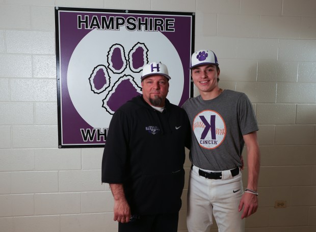 Anthony Borecky (left) and Hampshire shortstop Dominic Borecky (10) pose for a portrait during a practice at Hampshire High School in Hampshire on Friday, April 5, 2024. (Trent Sprague/for Chicago Tribune)