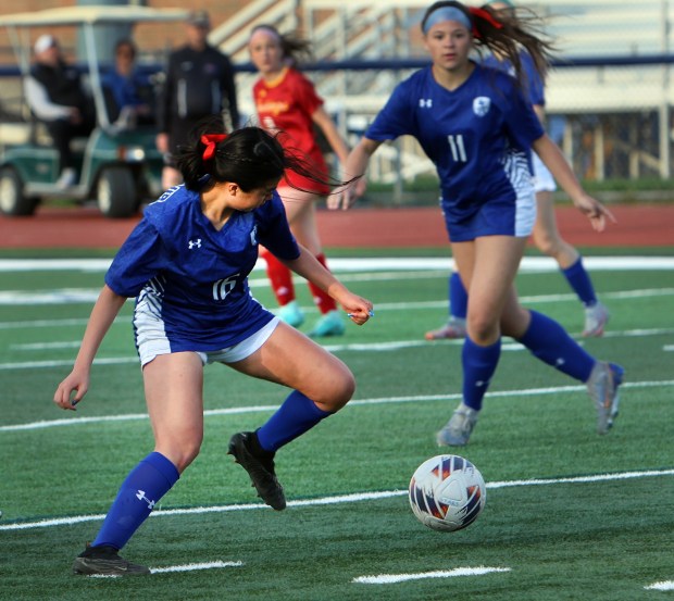Geneva's Leyna Yonehara moves the ball during the soccer game against Batavia Tuesday, April 23, 2024, in St. Charles. (James C. Svehla/for the Beacon News)