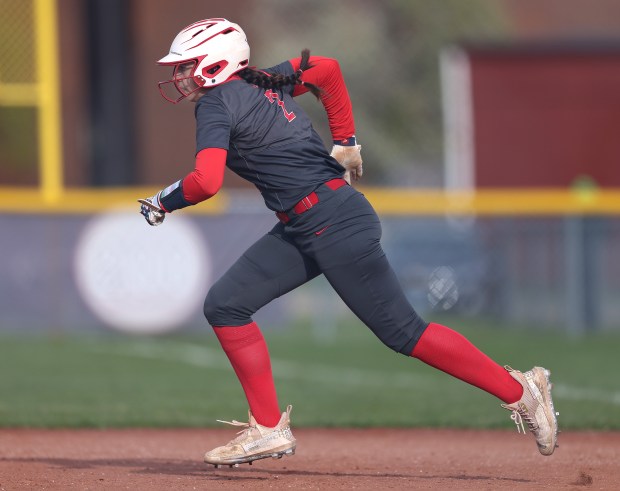 South Elgin's Mia Speidel (2) steals second during a Upstate Eight Conference game against Larkin in South Elgin on Monday, April 22, 2024. South Elgin won, 10-0 in five innings.H. Rick Bamman / For the Beacon-News