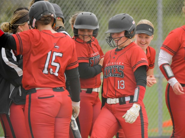 Yorkville's Ellie Fox (13) crosses home plate after a home run against Oswego East during game in Oswego on Wednesday, April 17, 2024. (Mark Black / for the Beacon-News)