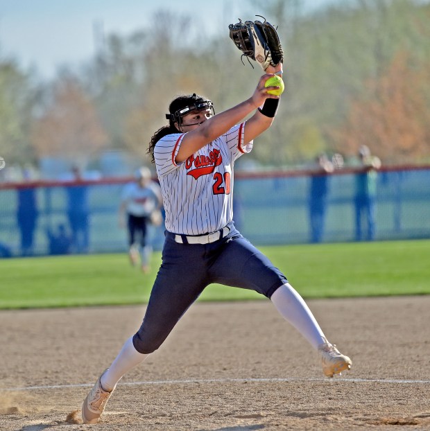 Oswego's Jaelynn Anthony delivers a pitch to home. Oswego defeated Yorkville in softball, 4-1, Monday, April 15, 2024, in Oswego, Illinois. (Jon Langham/for the Beacon-News)