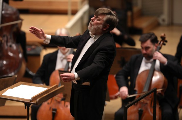 Conductor Andrew Davis leads the Chicago Symphony Orchestra at Symphony Center on Jan. 30, 2020. (Chris Sweda/Chicago Tribune)