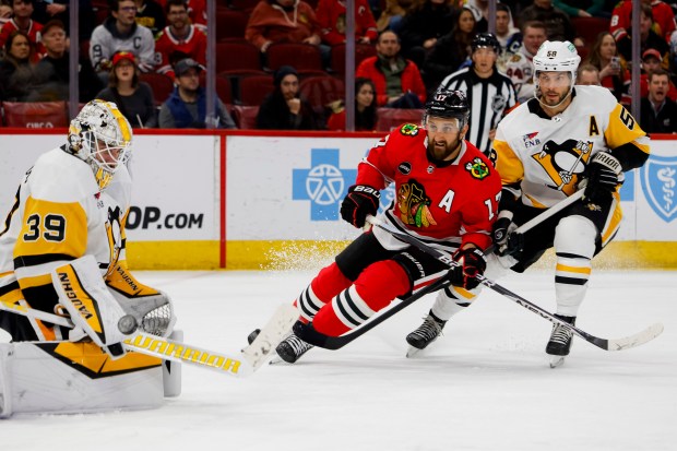 Chicago Blackhawks left wing Nick Foligno (17) attempts a shot on goal during a game between the Chicago Blackhawks and the Pittsburgh Penguins on Thursday, Feb. 15, 2024, at the United Center in Chicago. (Vincent Alban/Chicago Tribune)