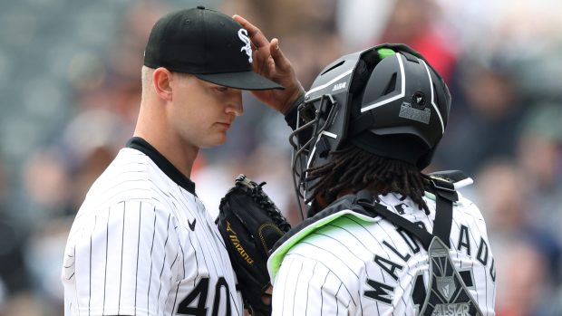 White Sox pitcher Michael Soroka gets a tap on the head from catcher Martín Maldonado after giving up a first-inning run against the Tigers on March 30, 2024, at Guaranteed Rate Field. (John J. Kim/Chicago Tribune)