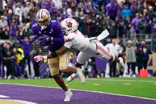 Washington wide receiver Rome Odunze makes a toiuchdown catch against Utah on Nov. 11, 2023, in Seattle. (AP Photo/Lindsey Wasson)