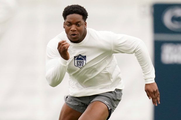 Penn State defensive end Adisa Isaac runs a drill during the team's pro day on March 15, 2024, in State College, Pa. (AP Photo/Matt Freed)