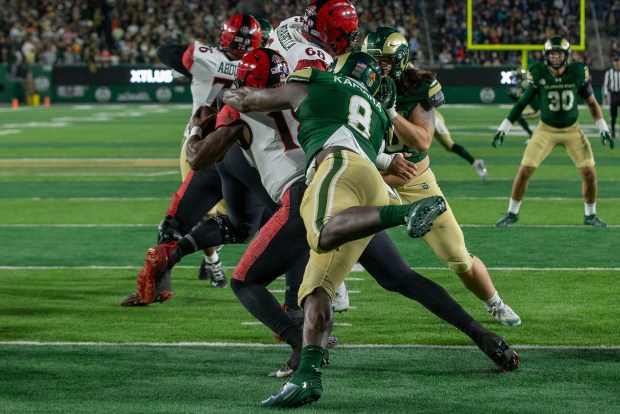 Colorado State defensive lineman Mohamed Kamara (8) sacks San Diego State quarterback Jalen Mayden in the end zone for a safety on Nov. 11, 2023, in Fort Collins, Colo. (Michael Brian/For the Reporter-Herald)