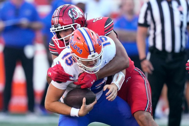 Utah defensive end Jonah Elliss sacks Florida quarterback Graham Mertz on Aug. 31, 2023, in Salt Lake City. (AP Photo/Rick Bowmer)