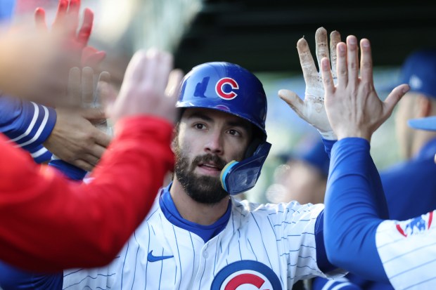 Cubs shortstop Dansby Swanson celebrates after hitting a three-run home run in the first inning against the Astros at Wrigley Field on April 24, 2024, in Chicago. (John J. Kim/Chicago Tribune)