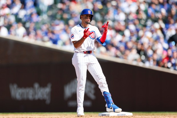 Chicago Cubs third base Christopher Morel (5) celebrates his double during the seventh inning against the Miami Marlins at Wrigley Field on April 21, 2024. (Eileen T. Meslar/Chicago Tribune)