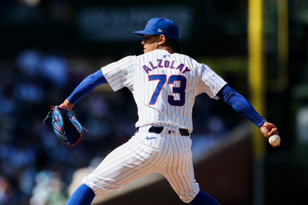 Chicago Cubs pitcher Adbert Alzolay (73) pitches during the eighth inning against the Miami Marlins at Wrigley Field on April 21, 2024. (Eileen T. Meslar/Chicago Tribune)