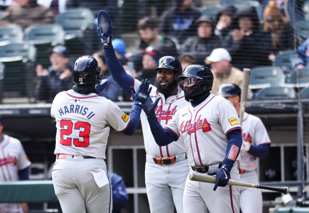 Atlanta Braves center fielder Michael Harris II (23) celebrates with his teammates after scoring a run during the fourth inning of the game against the Chicago White Sox at Guaranteed Rate Field in Chicago on April 1, 2024. (Eileen T. Meslar/Chicago Tribune)