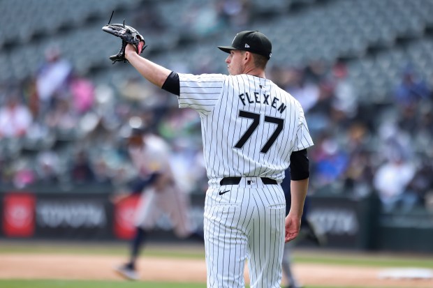 Chicago White Sox relief pitcher Chris Flexen (77) reacts after giving up a RBI double during the fourth inning of the game against the Atlanta Braves at Guaranteed Rate Field in Chicago on April 1, 2024. (Eileen T. Meslar/Chicago Tribune)