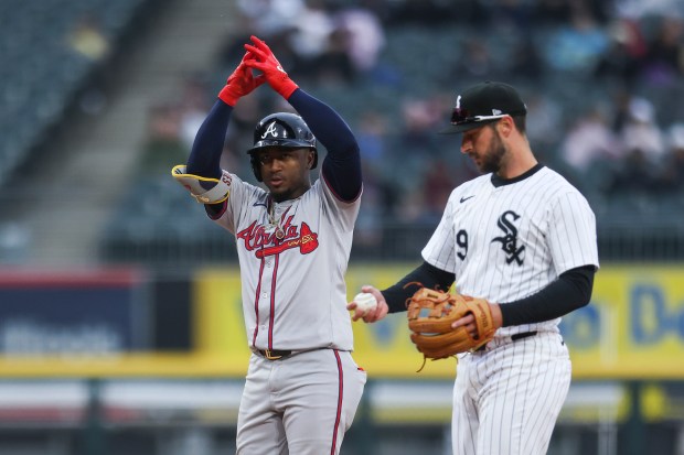 Atlanta Braves second baseman Ozzie Albies (1) celebrates a double during the sixth inning of the game against the Chicago White Sox at Guaranteed Rate Field in Chicago on April 1, 2024. (Eileen T. Meslar/Chicago Tribune)