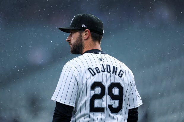 Chicago White Sox shortstop Paul DeJong (29) walks onto the field in the rain during the seventh inning of the game against the Atlanta Braves at Guaranteed Rate Field in Chicago on April 1, 2024. (Eileen T. Meslar/Chicago Tribune)
